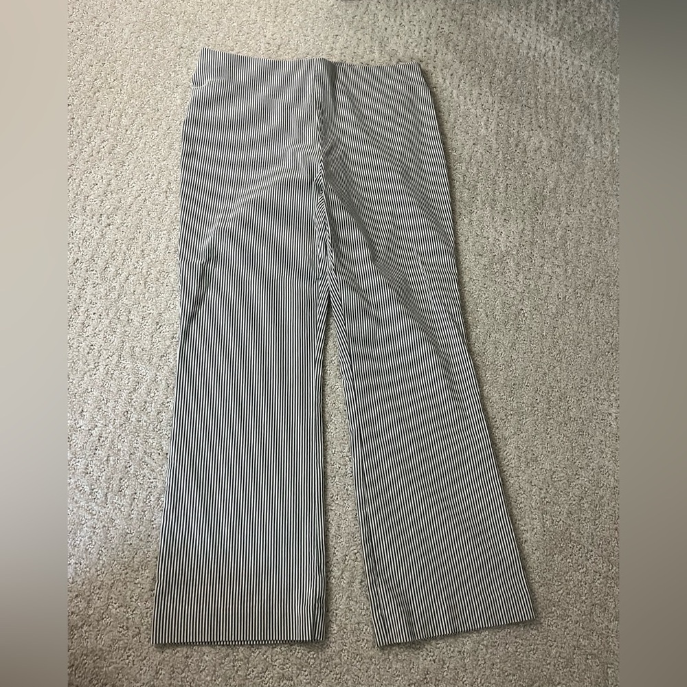 Gray and white striped trousers